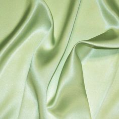 "Content100% Silk CompositionNatural Width45\" Weight (GSM)16.5MM OriginImported DESCRIPTION Silk Charmeuse possesses not only the finest aesthetics but retains the fluid sophistication most sought after in silk fabrics. It has a satin weave that allows the fabric to retain a soft feel and supple drape that high-end designers crave. Available in a variety of solids and prints, this fabric has many applications as it is composed of both a shiny face on one side and a matte face on the other. If y Vivienne Westwood Dress, Celery Green, Charmeuse Fabric, Decor Event, Vinyl Clothing, Muslin Fabric, Silk Charmeuse, Green Satin, Felt Fabric