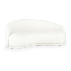 a white pillow sitting on top of a table