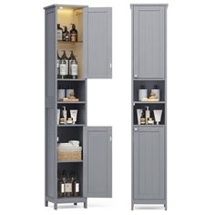 two tall gray storage cabinets next to each other with bottles on the top and bottom shelves