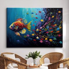 two wicker chairs in front of a painting on the wall with fish swimming by