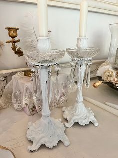 Gorgeous pair of antique brass candle holders. I have painted them creamy white.  Crystal glass cups on them are gorgeous. Size is 10 1/2" tall without candles in them . Candle holders were sourced from Europe. Country Victorian Decor, Painted Candle Holders, Antique Brass Candle Holders, Country Victorian, Painting Candle Holders, Painted Candles, Candle Sticks, Victorian Decor, Brass Candle Holders