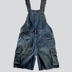 Take your urban style to the next level with the vintage-inspired 2023 Summer Collection Cargo Men's Denim Romper! This slim cut piece is the perfect blend of couture and nostalgic fashion. featuring suspenders and buttons closure to ensure a snug fit.Why You'll Fall In Love: Vintage Vibes: Capture the spirit of nostalgia with this denim romper. designed to evoke the iconic Y2K fashion of the millennium. Slim Fit: Its slim fit silhouette promises to flatter your frame. taking your look to the ne Utility Washed Blue Denim Jumpsuit With Pockets, Utility Denim Jumpsuit In Washed Blue With Pockets, Utility Dark Wash Shortalls With Pockets, Utility Style Dark Wash Shortalls With Pockets, Utility Overalls In Washed Blue With Pockets, Dark Wash Cotton Shortalls With Pockets, Retro Denim Blue Overalls With Pockets, Casual Denim Shortalls With Belt Loops, Utility Denim Overalls With Belt Loops