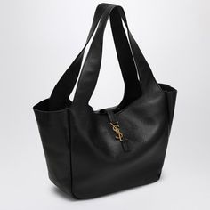 Black buckskin tote bag by Saint Laurent, featuring a tab and hook-and-eye fastening, front logo, a main compartment and an interlaced zipped pocket. Width 50 cm x Height 28 cm x Depth 18 cm Handle drop 28 cm Size Type: INTMaterial: LeatherSKU: 763435AADUU/P_YSL-1000_100 Our Products Are 100% Genuine. In All Cases We Stand By The Authenticity Of Every Product Sold On Our Site. Leather Tote Bag Women, Black Leather Tote Bag, Black Leather Tote, Logo A, Louis Vuitton Shoulder Bag, Bag Women, Chanel Handbags, Leather Tote Bag, Leather Tote