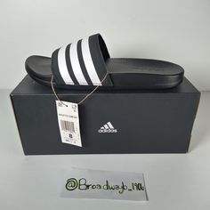 Adidas Originals Mens Adilette Stripes Black White Sandals Pool Slides Ap9971 Slide Feet First Into Comfort. With A Classic Design, These Adidas Slides Are The Epitome Of Versatility And Laid-Back Vibes. A Contoured Footbed Delivers Plush Cushioning For All-Day Comfort. The Stylish Bandage Upper Features 3-Stripes Branding. Black Slip-resistant Summer Sneakers, Black Adidas Slides For Summer, Black Slip-resistant Sneakers For Summer, Summer Black Adidas Sandals, Adidas Black Slides For Sports, Black Adidas Logo Sandals, Adidas Black Sporty Slides, Sporty Black Adidas Slides, Adidas Slip-on Sports Flip Flops