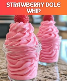 strawberry dole whip in a glass jar with strawberries on top and text overlay