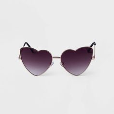 Keep your look both cute and stylish no matter what your day holds with these Metal Heart Sunglasses from A New Day™. The sunglasses sport a heart shape that flatters a variety of face shapes, and the frame comes in a gold finish for a fashionable look that's easy to style. The UV-resistant properties help to safeguard your eyes from harmful UV rays, complete with nosepads for comfortable wear. Whether you’re exploring the city or having a picnic with friends, these sunglasses are the perfect su Trendy Heart Print Sunglasses For Valentine's Day, Trendy Heart Shaped Tinted Sunglasses, Trendy Heart-shaped Tinted Sunglasses, Trendy Valentine's Day Sunglasses With Heart Print, Trendy Heart-shaped Sunglasses With Heart Print, Casual Heart-shaped Sunglasses With Heart Print, Heart-shaped Sunglasses With Heart Print, Trendy Heart-shaped Sunglasses With Mirrored Lenses, Casual Tinted Sunglasses For Valentine's Day