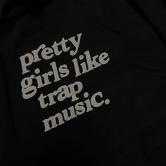 the words pretty girls like trap music printed on a black hoodie