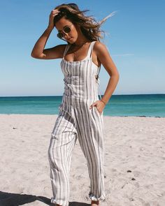 description Add some vacay vibes to your everyday style with the Sadie Jumper. Crafted from breezy fabric, this full-length jumpsuit features a flattering, slim straight leg, adjustable tie straps, front pockets, and a hidden zipper. Perfect for warmer days or as a stylish beach cover-up. info Full length jumper Pockets Tie straps Invisible zipper Slim straight leg Size XS-XL 85% viscose, 15% cotton Like all delicates, shape, color and fit are best preserved if hand washed in cold water. Lay fla Vacay Vibes, Beach Covers, Summer Nights, Invisible Zipper, Everyday Fashion, Full Length, Jumper, Cover Up, Straight Leg