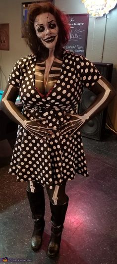 a woman dressed up as a skeleton with polka dots