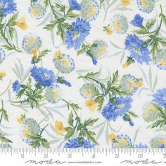 blue and yellow flowers on white fabric