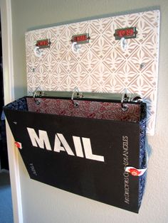 an open mailbox hanging on the wall