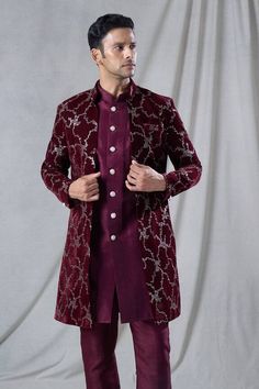 Maroon long jacket with abstract, sequin embroidery. Paired with an inner kurta. Comes along with a pant. - Aza Fashions Bollywood Style Long Sleeve Outerwear For Eid, Long Sleeve Bollywood Outerwear For Diwali, Fitted Festive Outerwear For Diwali, Fitted Festive Outerwear For Eid, Fitted Winter Set With Resham Embroidery, Festive Traditional Wear With Zari Work For Fall, Diwali Long Sleeve Outerwear With Zari Work, Designer Long Sleeve Outerwear For Diwali, Fitted Bollywood Outerwear For Festivals