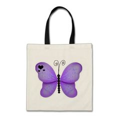 a pink butterfly tote bag with black handles and two hearts on the wings, in front of a white background