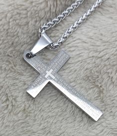 Lords Prayer cross pendant necklace. Inspirational Christian prayer. Stunning silver mirror finish. Best quality  stainless steel. Choice of chains. Lobster claw clasp. Great accessory gift for men or women. Pendant 45mm x 25mm. With 3mm flat cable, 3mm box chain or 3mm wheat chain. Available in various lengths to suit all tastes. Premium  stainless steel -  * Durable * Waterproof * Hypoallergenic * Tarnish and scratch resistant * High strength * Lasting colour * Shiny  * Comfortable to wear * A Engraved Stainless Steel Cross Necklace, Silver Stainless Steel Cross Pendant Necklace, Silver Stainless Steel Cross Necklace, Spiritual Silver Stainless Steel Cross Necklace, Engraved Silver Stainless Steel Cross Necklace, Lords Prayer, Christian Prayers, Women Pendant, The Lords Prayer