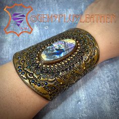 Welcome to see more pictures of this #tooledleather #labradorite #cuff #bracelet in my #Etsy shop #Gemsplusleather 😌 #Gemsforall #leather #leathercraft #Leatherwork #artisan #artisanjewelry #leatherjewelry #instajewelry #jewelrygram #gemstonejewelry #jewelry #leatherjewelry #leatherart #Handpainted #giftforher #handmadejewelry #gemstonejewelry #etsyshop #etsyseller #handmadejewelry #handmadewithlove #handmade Sea Inspired Jewelry, Leather Creations, Leather Ideas, Leather Cuff Bracelet, Hand Painted Jewelry, Bright Star, Hand Tooled Leather, Leather Cuffs Bracelet, Handmade Holiday