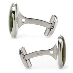 Sage green Seraphinite has been cut into a cushioned disc and surrounded in shiny Sterling Silver to create this set of elegant cufflinks. These heirloom-quality cufflinks add a brilliant shimmer of elegance to any outfit while remaining masculine and dignified. The expert craftsmanship of our Sterling Silver cufflinks ensures long-lasting durability and a classic look that is sure to never go out of style. Luxury Oval Cufflinks For Formal Occasions, Elegant Oval Cufflinks For Formal Occasions, Modern Green Jewelry For Formal Occasions, Classic Green Cufflinks For Formal Occasions, Elegant Oval Cufflinks For Business, Elegant Green Cufflinks For Formal Occasions, Oval Polished Cufflinks For Business, Classic Green Cufflinks As Gift, Classic Green Cufflinks For Gift