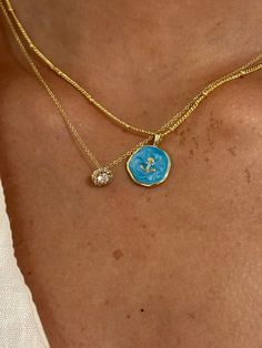 You’ll always be on island time with this best seller! This handmade necklace features a gorgeous turquoise anchor pendant on a gold plated satellite chain. Wearing this necklace is guaranteed to make you feel like you're out on the water on a sunny day! The gold satellite chain adds a simplistic touch with a pop of rich sparkling turquoise to bring it all together. The layering options are endless with this necklace. Wear it by itself as a statement piece, or layer with more gold and blue toned Preppy Jewelry, Hawaii Trip, Anchor Pendant, Gold And Blue, Pendant Gold, Hawaii Travel, Round Pendant, Handmade Necklace, Sunny Day