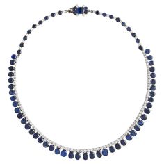 Natural Sapphire Burmese No heat and Diamond on white gold Necklace. Total Sapphire weight: estimated to be 41.10 carats. Total Diamond weight: estimated to be 5.17 carats. According to the Ssef Swiss Laboratory Report 122750, the 68 sapphires are natural non heated of Burmese origin. Formal White Gold Tennis Necklace With Gemstone, Classic Platinum Gemstone Necklace, Classic Platinum Necklace With Gemstone, Classic Platinum Gemstone Necklaces, Luxury Platinum Pear-shaped Necklace, Formal Briolette Sapphire Necklace, Oval Platinum Necklace With 17 Jewels, White Gold Sapphire Pear-shaped Necklace, Pear-shaped Sapphire Necklace In White Gold