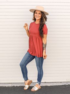 Light brick colored short sleeve babydoll top.