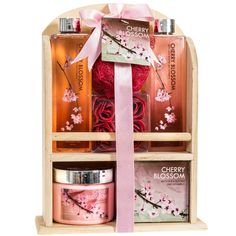 This cherry blossom gift set packs this powerful yet relaxing aroma into a spa experience you can indulge in at home any time of the year. | Bring the sensational scent of Japan's celebrated cherry blossom to your home! In spring, cherry trees across Japan bloom in beautifully delicate pink and the air is sweet with a romantic floral scent that signals the end of winter and the rebirth of life in spring. This cherry blossom gift set packs this powerful yet relaxing aroma into a spa experience yo Bath And Body Gift Set, Wood Caddy, Bath & Body Gift Set, Spa Basket, Boyfriend Gift Basket, Best Gift Baskets, Spa Gift Set, Gift Baskets For Women, Wine Gift Baskets