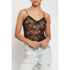 A wardrobe essential, this lace v-neck cami top is the perfect way to update your look! Add some subtle elegance and style with the timeless lace detailing. With a figure-flattering fit, this cami top is sure to make you look and feel your best. Gotta love a cami that never goes out of style! See through lace Spaghetti strap V neck Tight fit 95% Nylon, 5% Spandex Chic V-neck Tank Top With Lace Trim, Chic Lace Cami Top With Built-in Bra, Fitted V-neck Lace Top Camisole, Feminine V-neck Delicate Lace Top, Delicate Lace Top With Spaghetti Straps For Night Out, Spaghetti Straps Lace Top For Night Out, Chic Lace Tops With Spaghetti Straps, Feminine Lace V-neck Camisole, Sheer Fitted Cami Lace Top