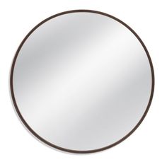 a round mirror with brown trim around the edges and an oval shape on it's side