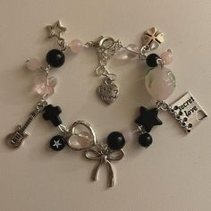 a charm bracelet with charms on it