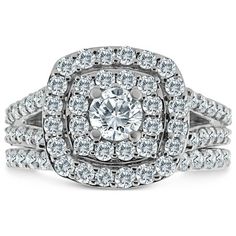 a diamond ring with two rows of diamonds on top and bottom, set in 18k white gold