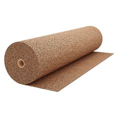 a roll of cork is laying on the floor next to it's cardboard wrapper