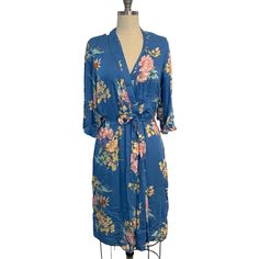 New With Tags. Rayon Robe With All Over Floral Print. 100% Rayon. Blue Beachwear Sleepwear For Vacation, Fitted Blue Sleepwear For Spring, Blue Bohemian Sleepwear With Floral Print, Blue V-neck Sleepwear For Vacation, Bohemian Floral Print Robe For Loungewear, Light Blue V-neck Sleepwear For Spring, Blue V-neck Sleepwear For Spring, Blue Bohemian Floral Print Sleepwear, Blue Floral Print Beach Robe