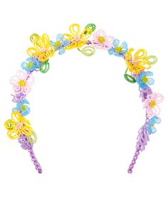 a colorful headband with flowers and beads on it's side, in the shape of a butterfly