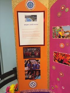 an orange and pink display with pictures on it