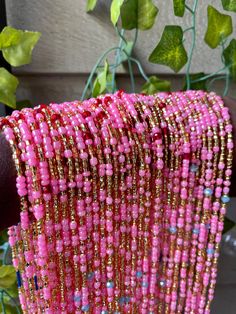 Traditional Ghanaian Thread Tie Waist Beads One size fits all Color: Pink with blue and red details Opal Waist Beads, Aesthetic Waist Beads, Waist Jewelry Beads, Waist Beads Aesthetic, Waist Beads Ideas, Red Waist Beads, Pink Waist Beads, Body Jewelry Diy, Beaded Jewelry Pattern