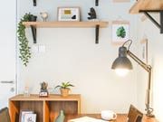 a living room filled with furniture and decor