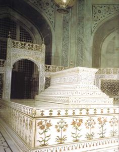 an intricately decorated staircase in the middle of a building