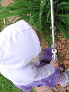 Kids slide the washers to the top of the metal rod and release them. As the washers slowly cascade to the bottom, they make a beautiful metallic twinkling sound, similar to that of a rain stick. Wind chime idea, too. Outdoor Musical Instruments, Preschool Garden, Sensory Garden, Summer Fun List