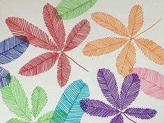 an image of colorful leaves painted on paper