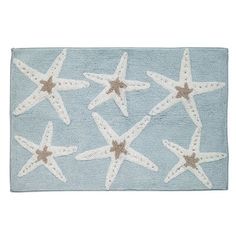 a blue rug with starfishs on it