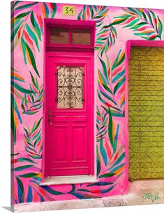 a bright pink door and window in front of a colorful wall with palm leaves painted on it