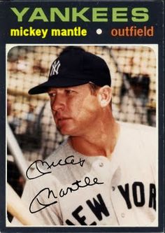 an autographed baseball card with a man in a yankees uniform holding a bat