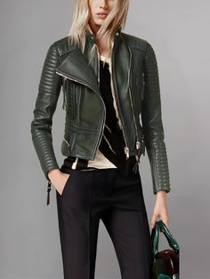 Elevate your biker chic look with the Women Lambskin Stylish Motorcycle Green Leather Jacket. This jacket is a perfect blend of edgy style and luxurious comfort, designed to make you stand out in any crowd. Crafted from premium lambskin leather, this jacket features a stunning green hue that adds a pop of color to your wardrobe. The soft and supple leather not only feels luxurious against your skin but also provides durability, ensuring that this jacket will be a staple piece in your wardrobe for years to come. The standout feature of this jacket is its stylish motorcycle-inspired design. With its asymmetrical zipper closure, quilted shoulder panels, and zippered pockets, this jacket exudes urban sophistication and edgy flair. Whether you're hitting the open road on your motorcycle or simp Luxury Biker Jacket With Asymmetrical Zip For Fall, Luxury Asymmetrical Zip Biker Jacket For Fall, Luxury Long Sleeve Biker Jacket For Spring, Luxury Fall Biker Jacket With Zipper Closure, Luxury Leather Jacket With Zipper For Fall, Luxury Biker Jacket With Zipper For Fall, Luxury Biker Jacket With Zipper Closure For Fall, Designer Biker Jacket With Zipper Closure For Spring, Designer Biker Jacket With Zipper For Spring