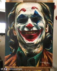 a close up of a painting of a joker