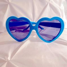 Bew Blue Heart Sunglasses Blue Fun Sunglasses With Tinted Lenses, Fun Blue Sunglasses For Parties, Fun Blue Sunglasses For Party, Blue Tinted Fun Sunglasses, Fun Blue Tinted Sunglasses, Blue Retro Plastic Sunglasses, Retro Blue Sunglasses For Spring, Retro Blue Plastic Sunglasses, Blue Sunglasses With Uv Protection For Parties