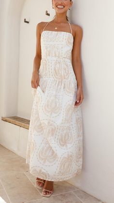 Embrace elegance with our Neutral Palm Tiered Maxi Dress, featuring a delicate halter tie, discreet side zipper, and a chic optional waist tie for a tailored silhouette. Chic White Maxi Dress With Tie Straps, Chic Fitted Maxi Dress With Tie Fastening, Chic Halter Neck Dress With Tie Waist, Fitted Halter Neck Dress With Tie Waist, Elegant Fitted Maxi Dress With Tie Fastening, Beige Beach Dress With Tie Waist, White Vacation Dresses With Tie Fastening, Elegant Beige Midi Dress With Tie Straps, Chic Cream Dress With Tie Straps