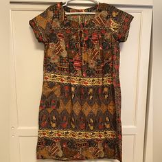 Autumn Colored, Batik House Dress, Like New, Never Worn. Possibly Handmade, It Was A Gift. No Size But Would Fit Anywhere From A Small To Large. Casual Batik Print Tunic Dress, Casual Brown Batik Print Dress, Casual Brown Dress With Batik Print, House Dress, Fall Colors, Batik, Like New, Red, Dresses