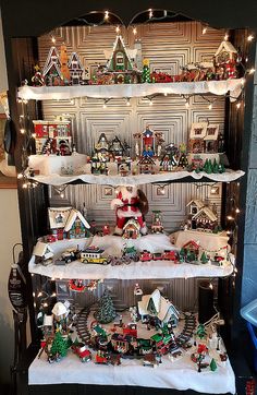 a display case with christmas decorations on it