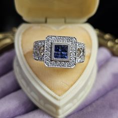 18k Sapphire & Diamond Ring Size 7. Stamped 750 Which Translates To 18k. White Gold. Genuine Gemstones. This Is A Statement Ring. Made To Be Noticed. Purchased And Never Worn. There May Be A Tinge Of Yellow Showing Through On The Back Of The Band. I'm Not Sure If Its Made That Way But Wanted To Note It. Probably Because Its 18k. You Could Get It Rhodium Dipped If You Want. See All Pics. This Ring Is Amazing And It's Time Someone Wears It! See My Other Listings For Sterling Silver, Solid 10k, 10k Elegant Tanzanite Diamond Cut Ring, Platinum Sapphire Ring With Pave Setting In White Gold, Sapphire Platinum Jewelry With Pave Setting, Anniversary Platinum Sapphire Ring With Pave Setting, Anniversary Sapphire Ring With Pave Setting In Platinum, Platinum Sapphire Ring With Pave Setting For Anniversary, Sapphire Rings With Pave Setting As Gift, Elegant Sterling Silver Sapphire Ring With Pave Setting, Elegant Sapphire Ring With Pave Setting In Sterling Silver