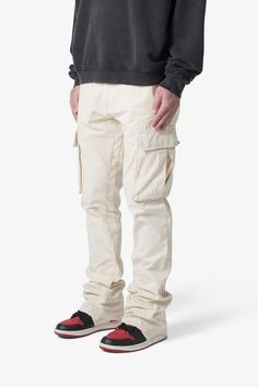 the Bootcut Cargo Pants are designed with our new B fit, which is slim through the thigh and features a slight flare at the leg opening and is constructed from washed twill, with a vintage wash, and finished with tonal self panelling. details flare at leg opening 100% cotton model is 6’1, 140 lbs and wears a size 30 Bootcut Cargo Pants, 140 Lbs, Fuzzy Cardigan, Denim Flares, Knit Shorts, Band Tees, Summer Shorts, Black Denim, Cargo Pants