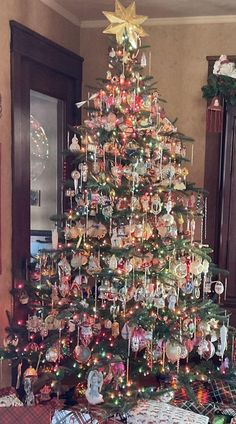 a decorated christmas tree in a living room