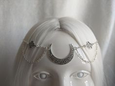 A gorgeous head chain featuring a silver filigree moon and two filigree charms. Perfect for renaissance fairs, weddings, cosplay, or any event of your choosing! Choose between silver or bronze! Fits head circumferences from 21 inches to 24.5 inches. Silver Fantasy Jewelry For Festivals, Handmade Silver Body Jewelry For Festivals, Spiritual Silver Body Jewelry For Festivals, Handmade Silver Fantasy Body Jewelry, Silver Bohemian Headband, Handmade Silver Headband, Fantasy Metal Body Jewelry For Festival, Silver Gothic Headpiece For Festivals, Fantasy Festival Jewelry Headband